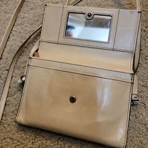 Distressed cross body bag